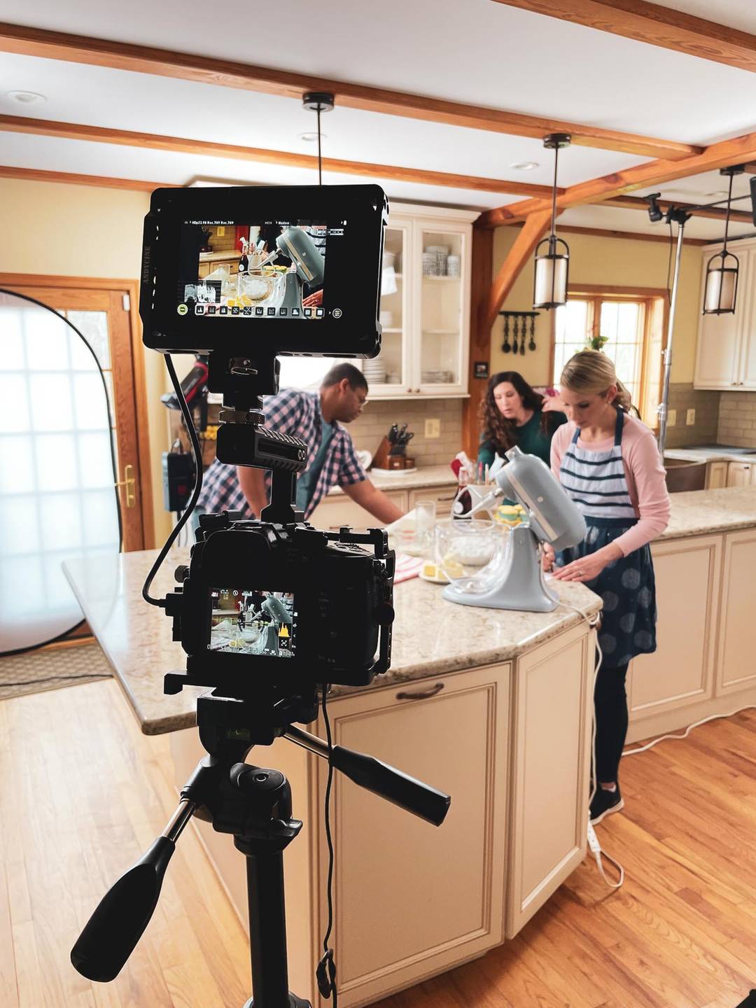 Sally at counter with camera equipment