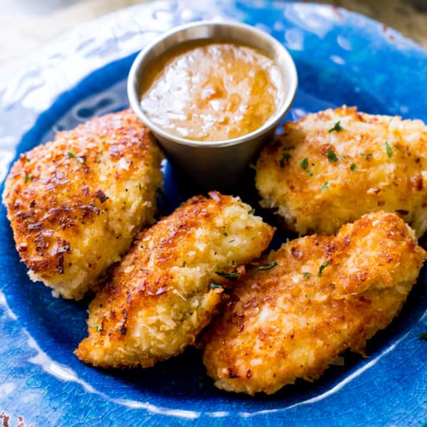 coconut chicken on blue plate