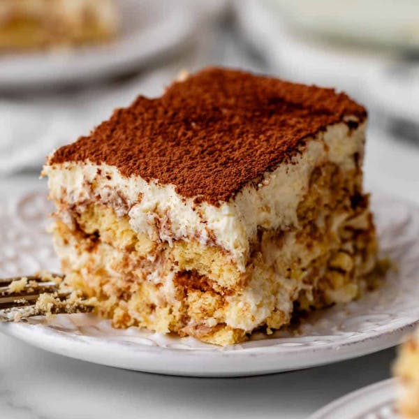 slice of tiramisu on a white plate