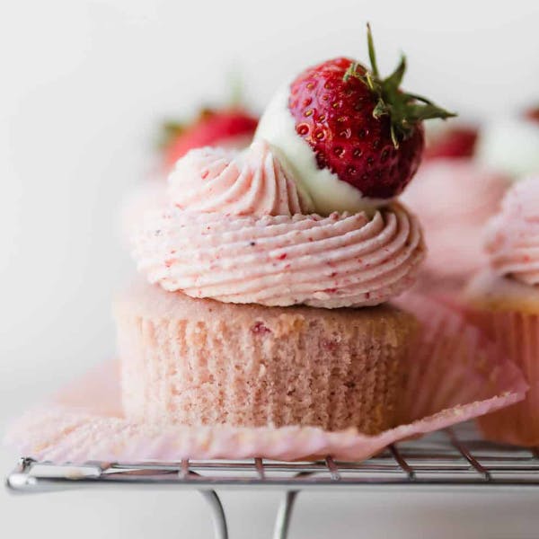 pink strawberry cupcake with pink strawberry frosting