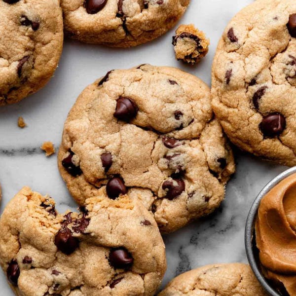 peanut butter chocolate chip cookies with marble background
