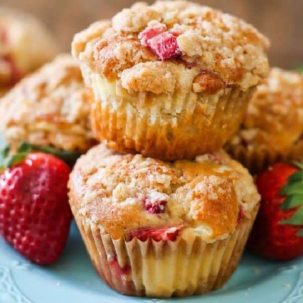 two muffins stacked on top of each other on a blue plate