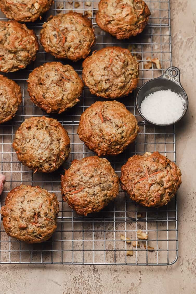 overhead image of morning glory muffins on a cooling rack