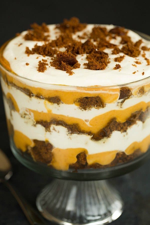 Pumpkin gingerbread trifle in a glass trifle dish.