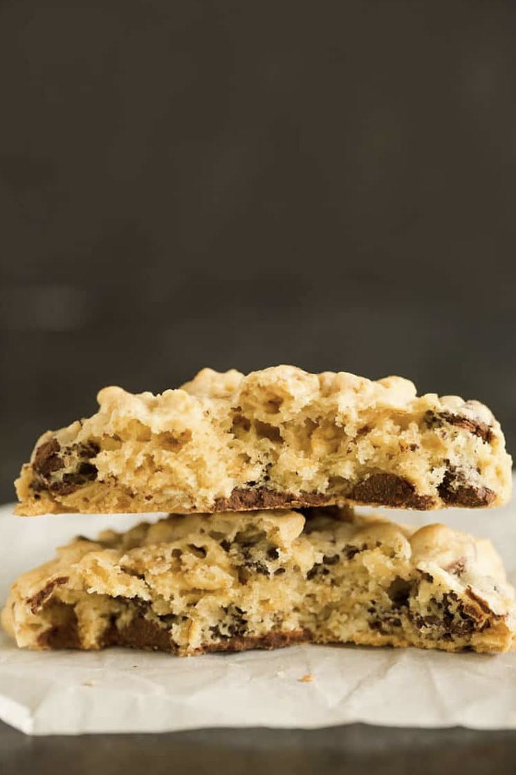 oatmeal chocolate chip cookie broken in half and stacked