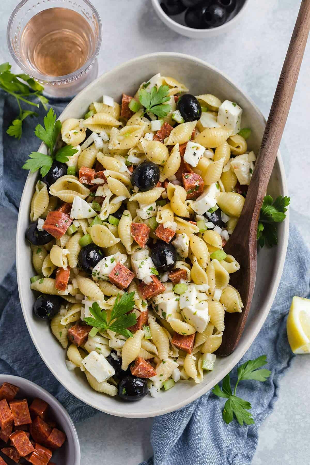 italian pasta salad in a white serving bowl