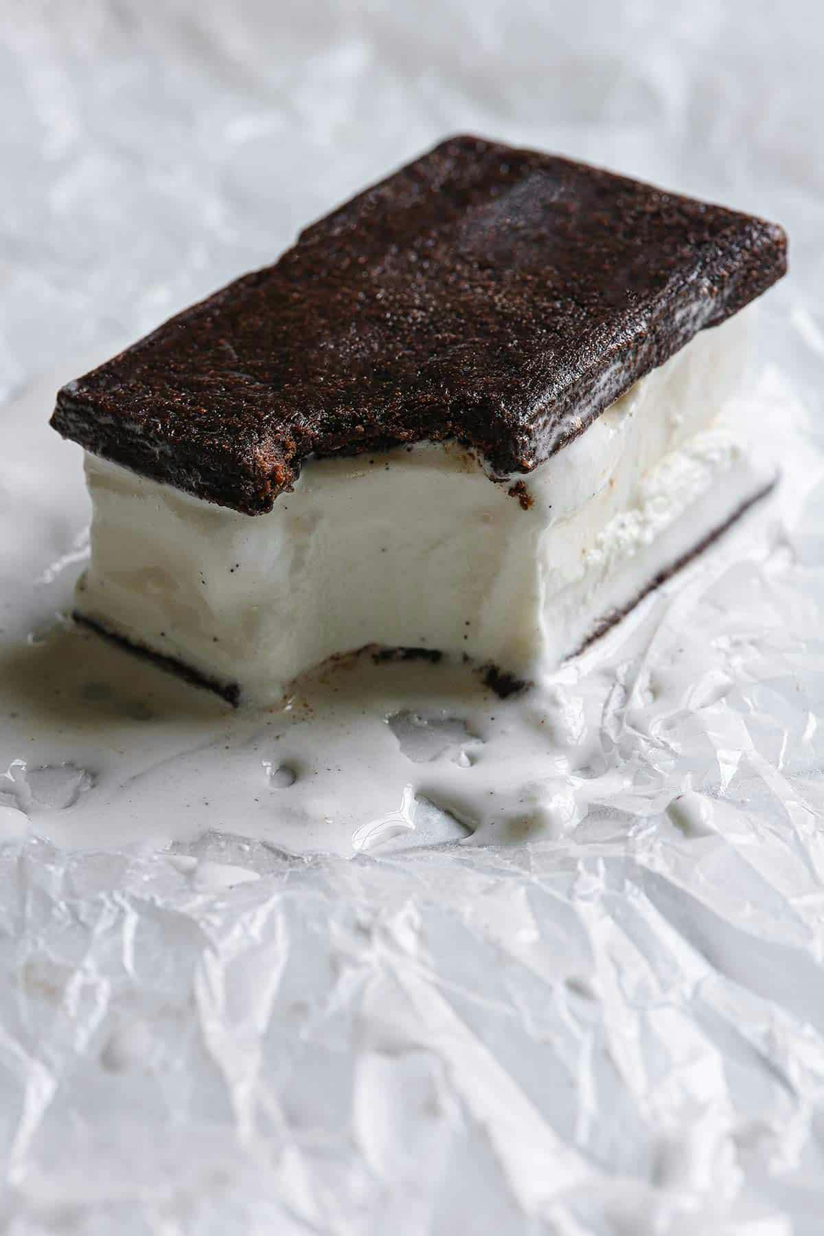 ice cream sandwich with a bite taken from it