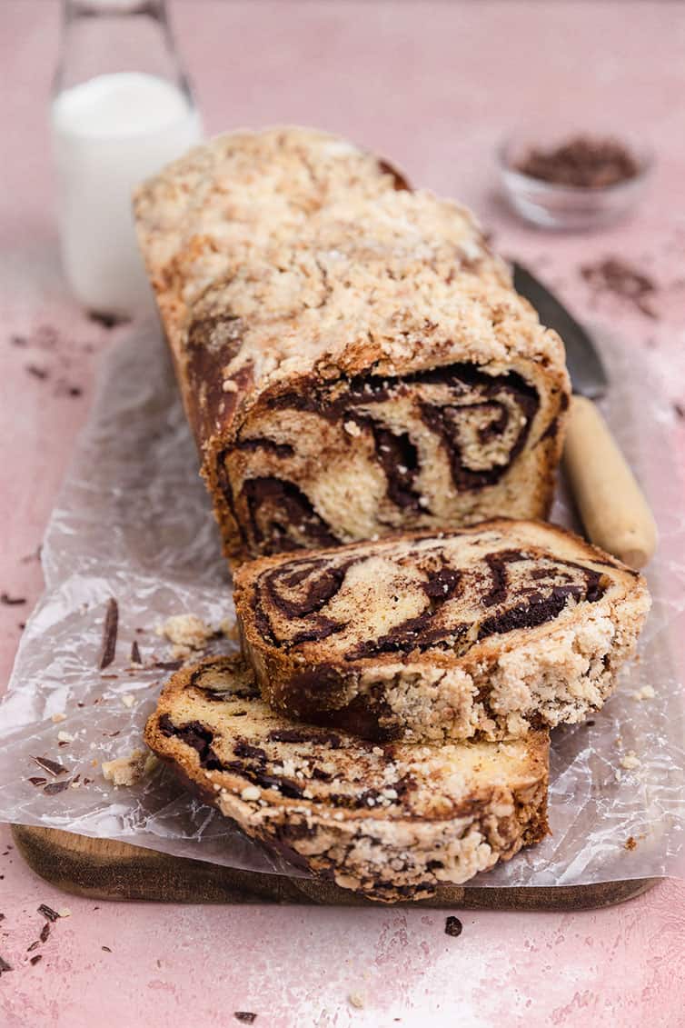 chocolate babka with a slice cut showing the inside swirls