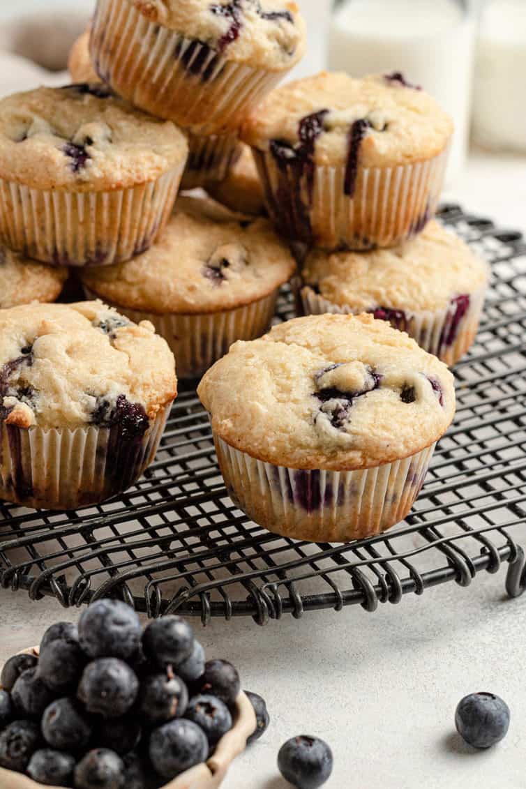 blueberry muffins on a cooling rack