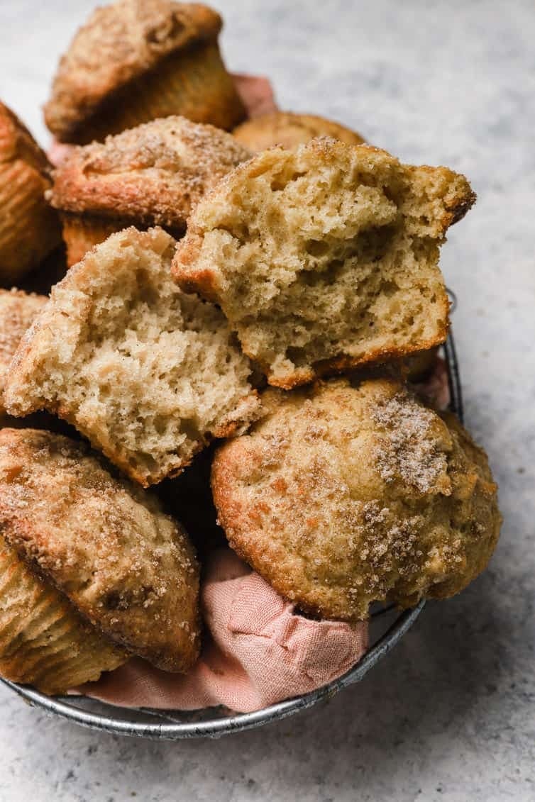 Apple cinnamon muffins in a basket.