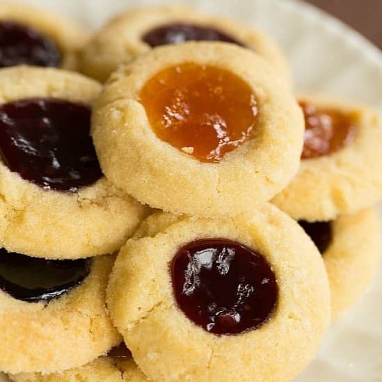 Pieces of peppermint bark on a white plate.