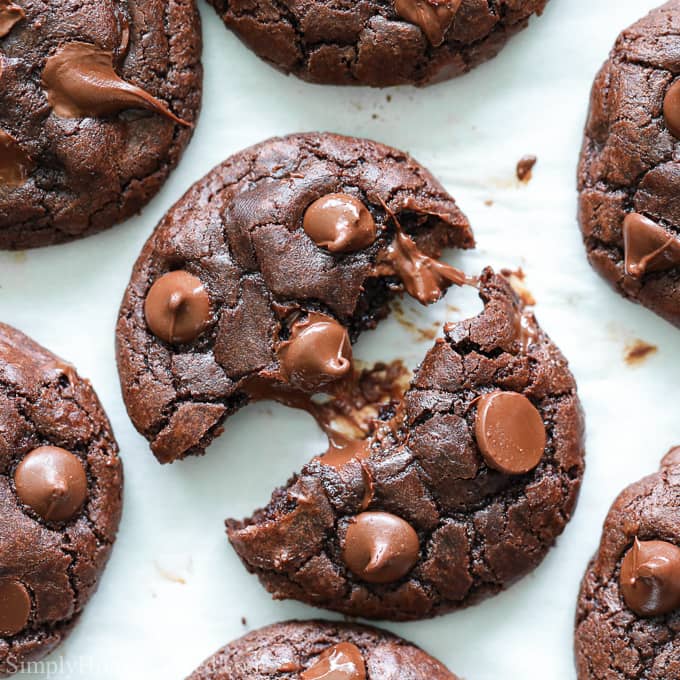 overhead image of double chocolate cookies on a white background
