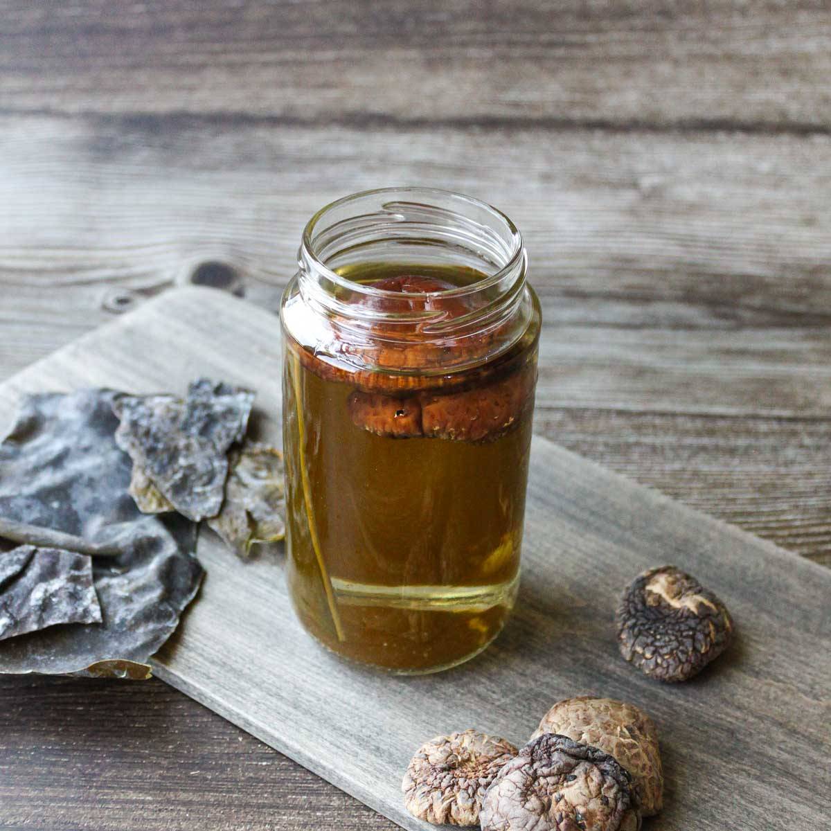 Vegan dashi in a glass container.