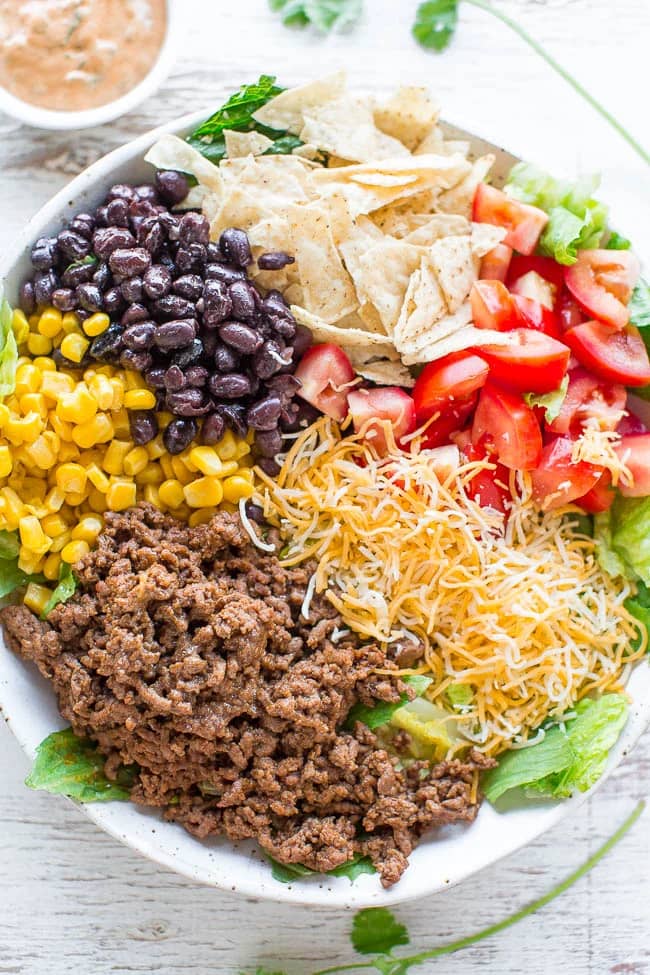 Loaded Beef Taco Salad with Creamy Lime Cilantro Dressing