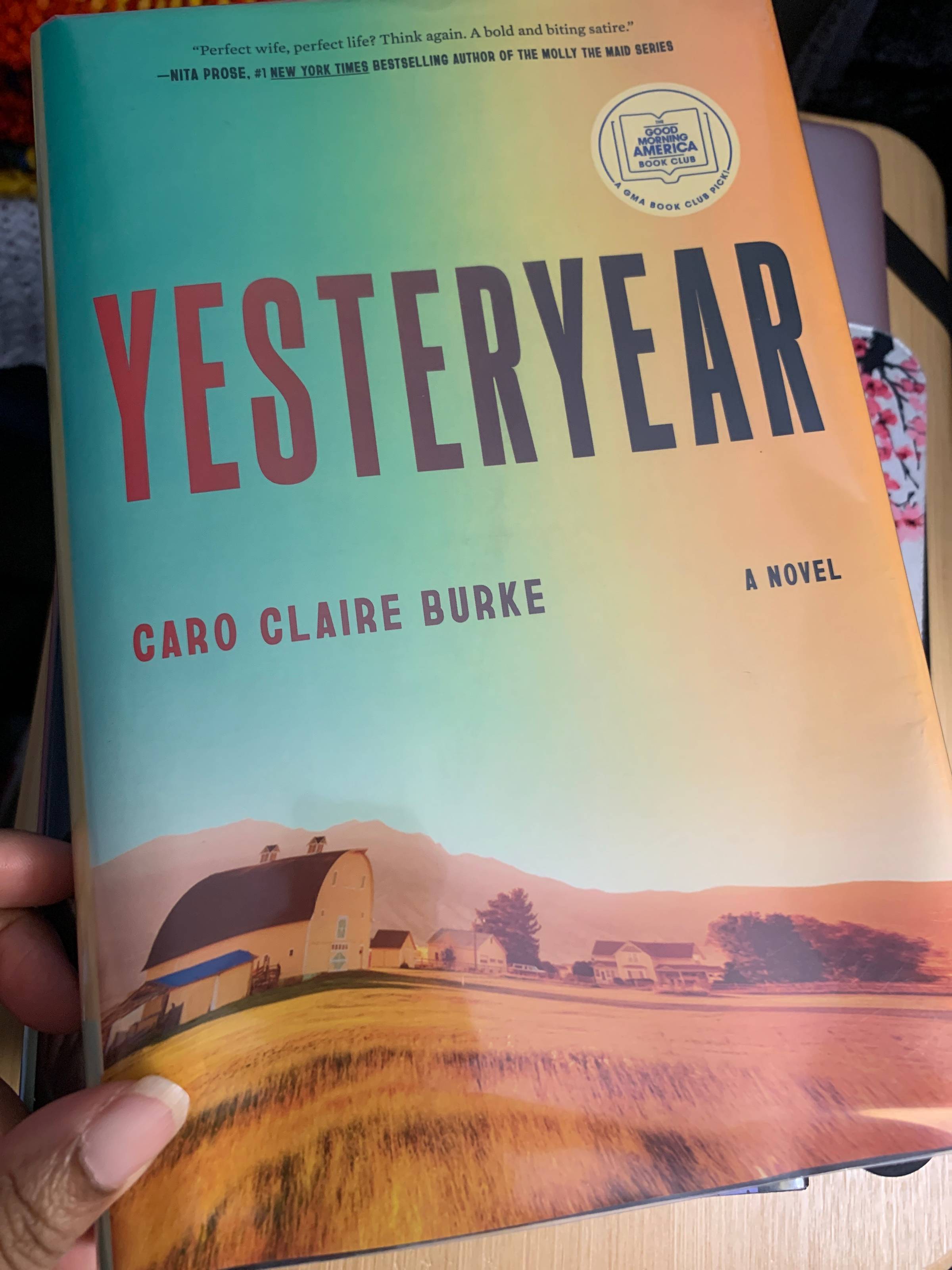 Book cover for Yesterday yellow and green with hills in the background and a ranch style house in foreground