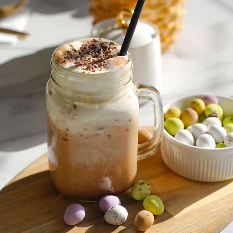 Iced coffee with whipped cream and chocolate shavings