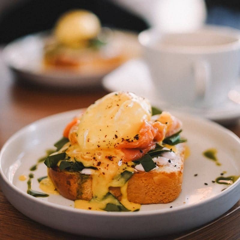 A plate of food on a wooden table