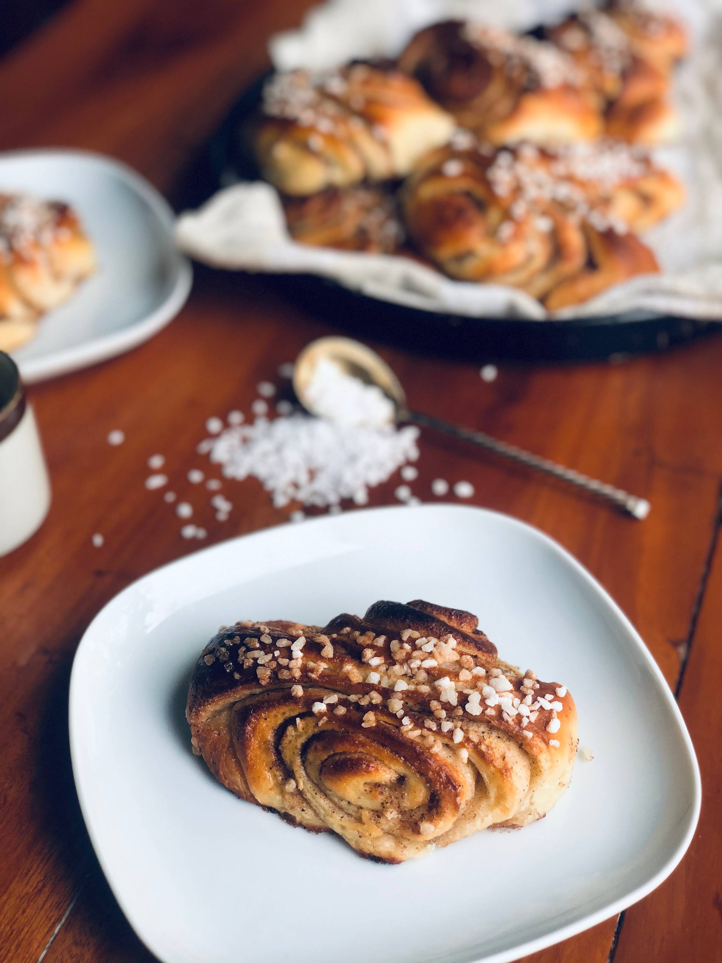 A Finnish cinnamon roll on the plate for the Cinnamon Roll Day