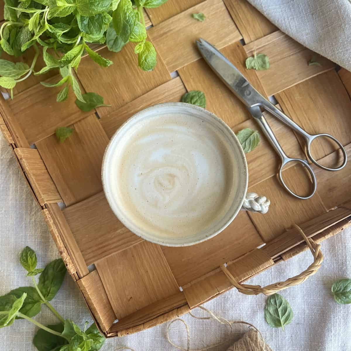 A cup of mint latte with natural, homemade mint syrup.