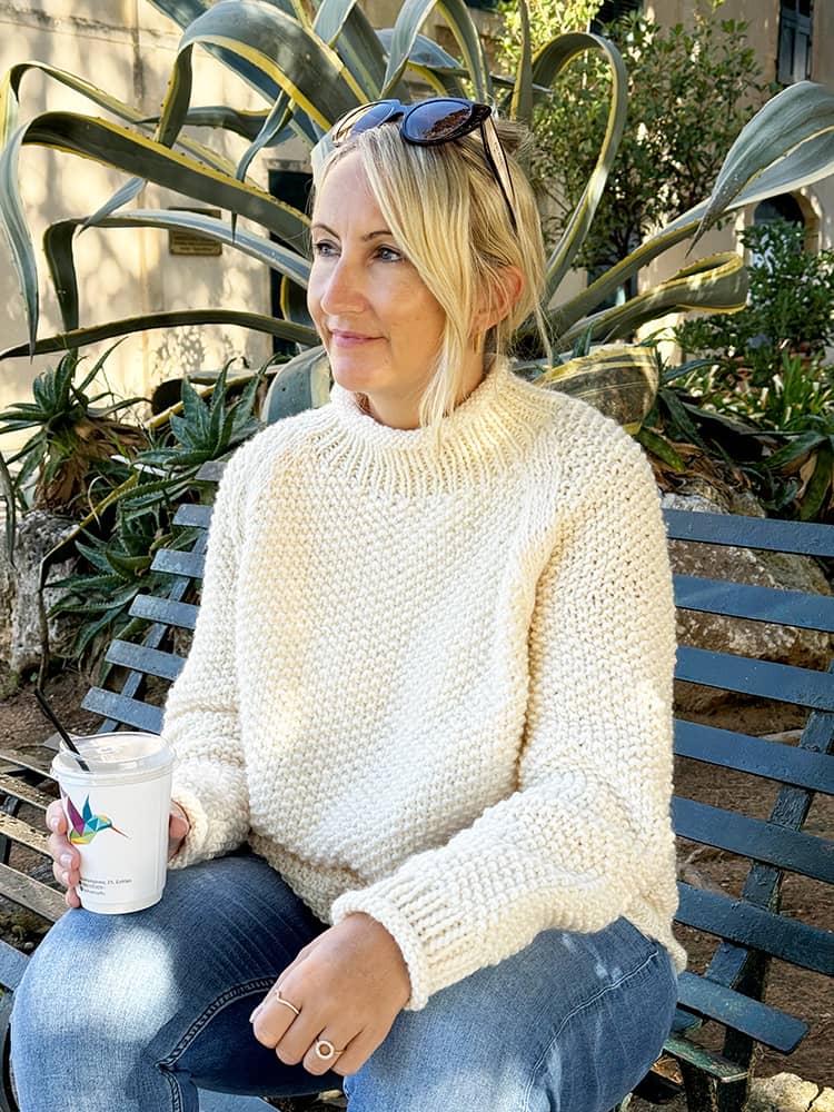 Louise wearing a knitted skinny scarf