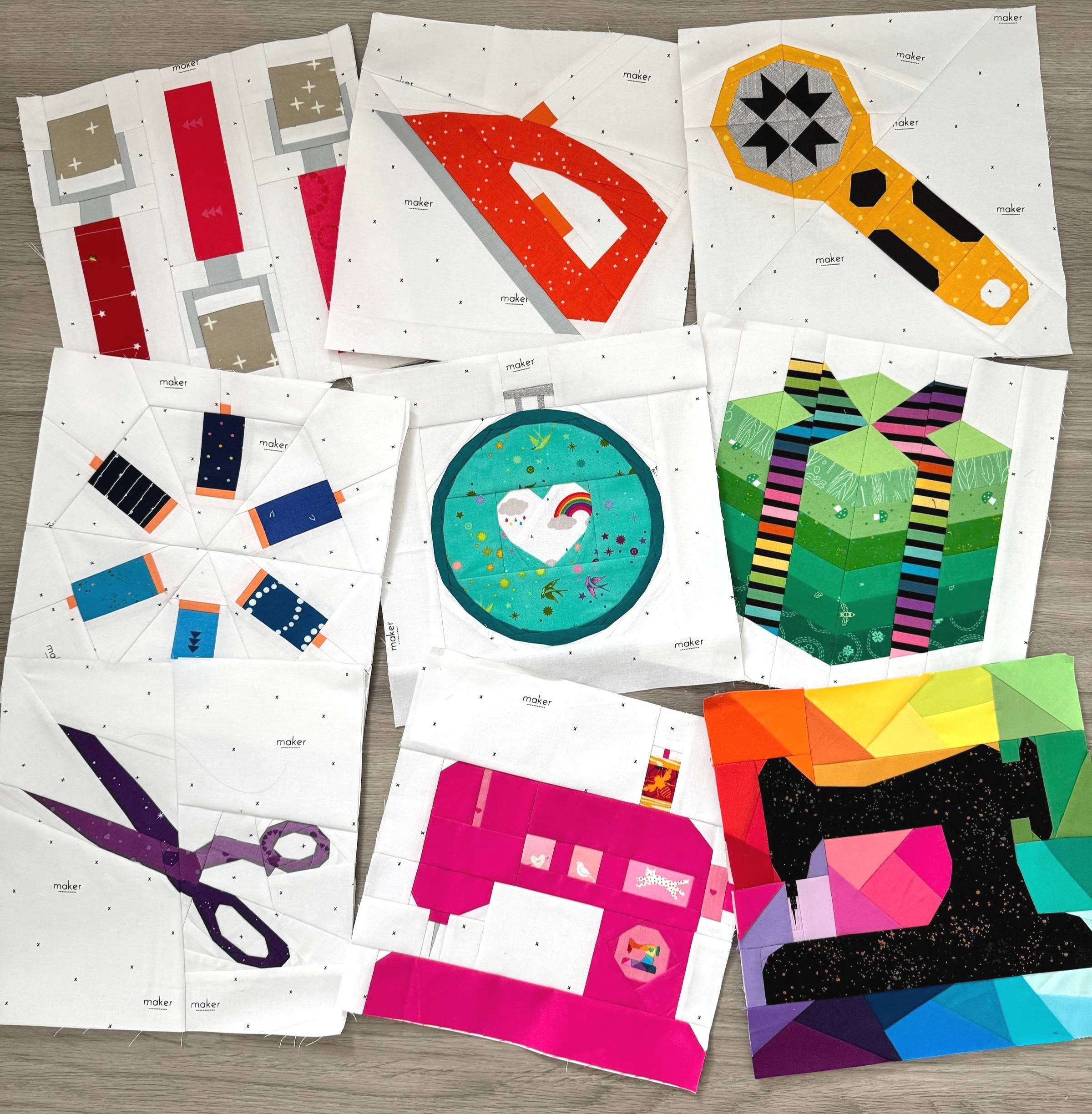 a collection of nine foundation pieced patterns showing different sewing room items including scissors, thread, machine, fabric, hoop, seam roller, iron and rotary cutter