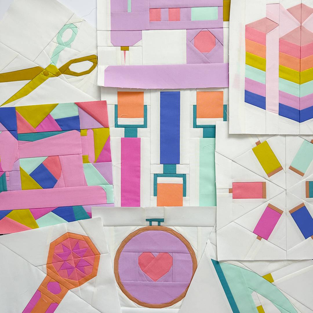 nine foundation paper pieced blocks in pastel rainbow colours showing various tools and notions found in the sewing room