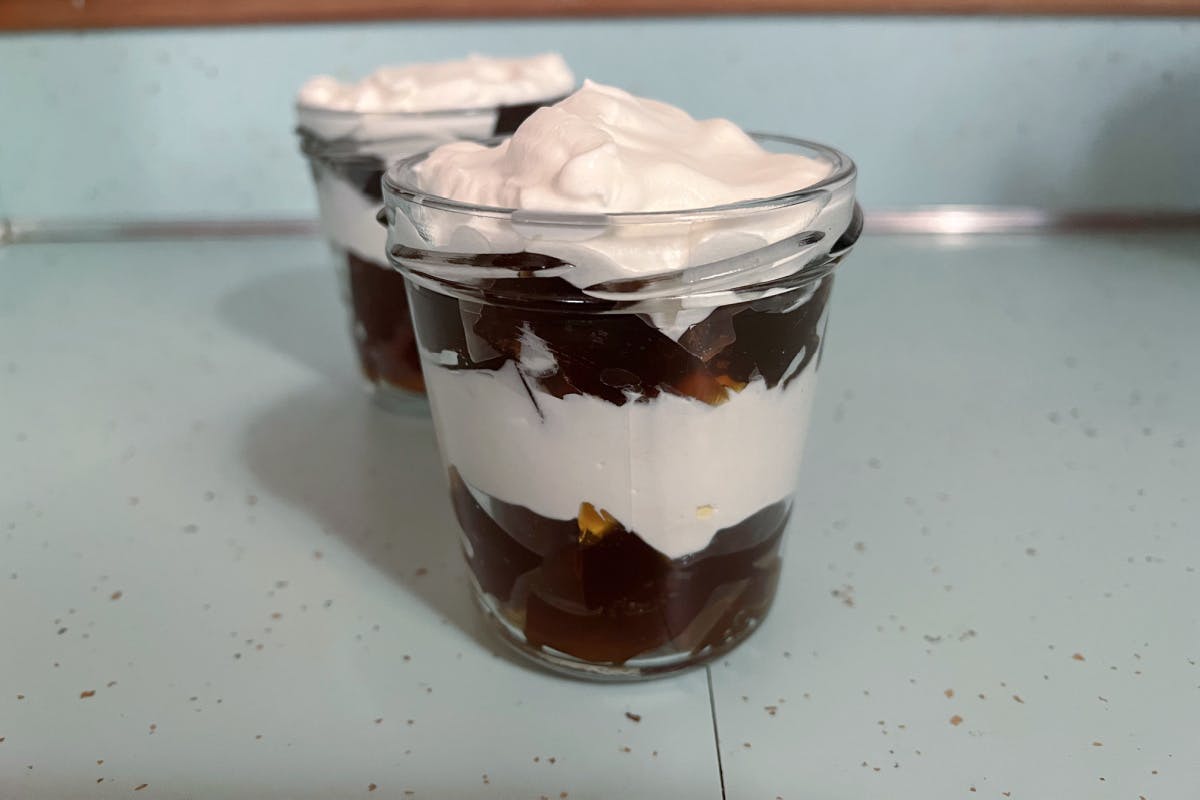 coffee jelly and whipped cream in jars