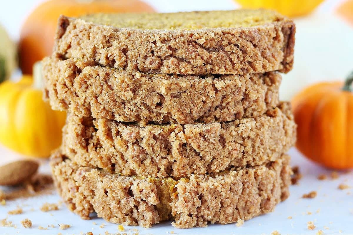 Four slices of pumpkin bread. 