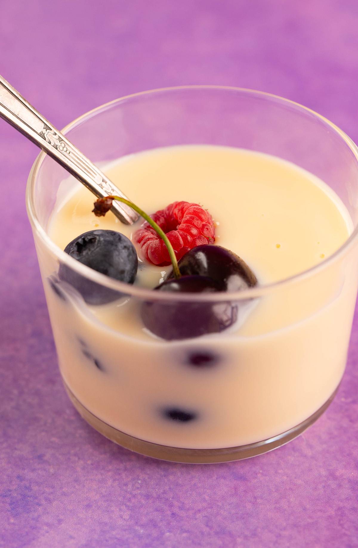 Homemade custard served with fresh berries.