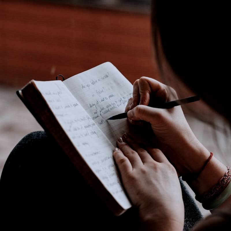 unknown person writing