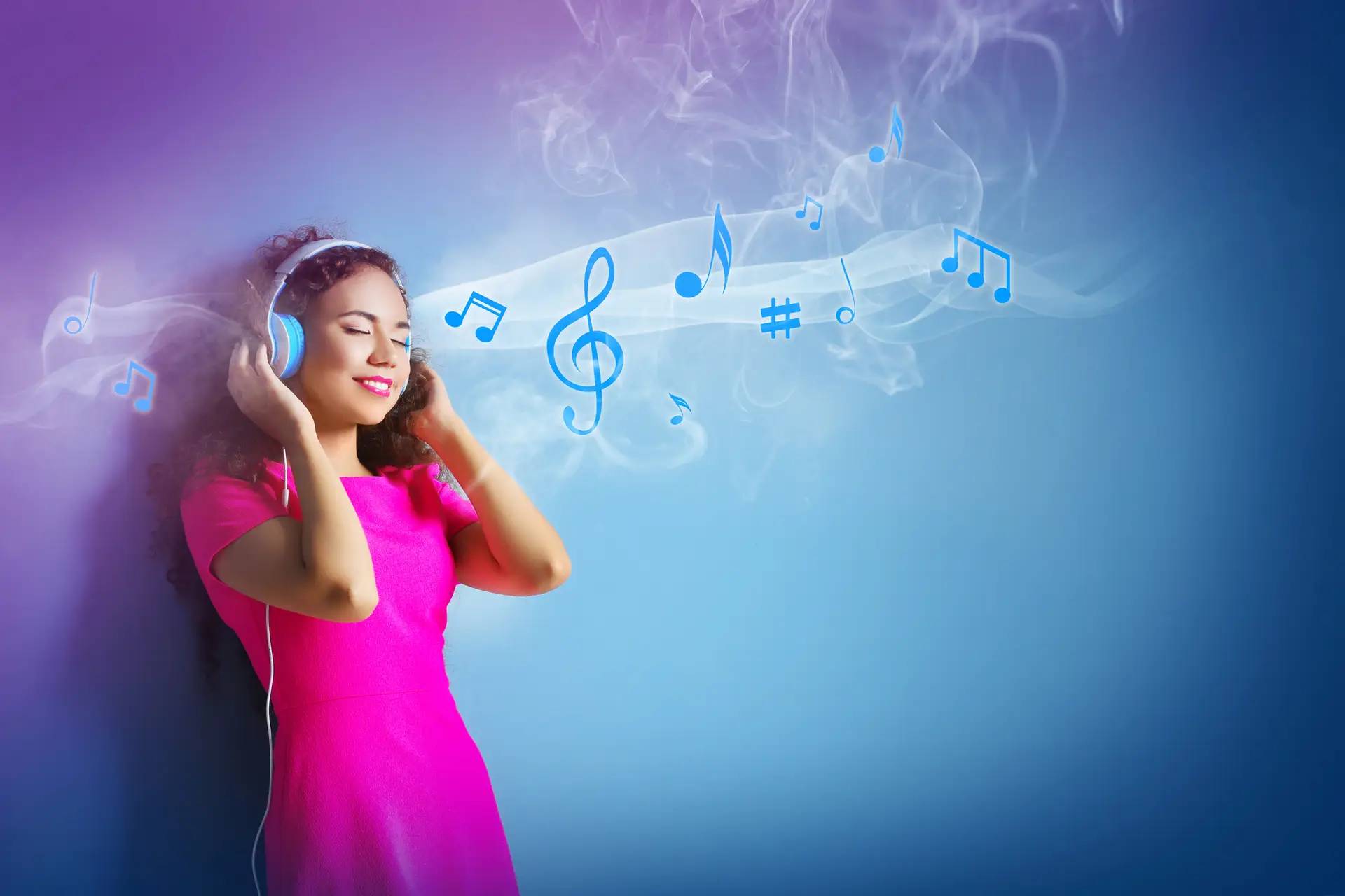 Woman listening to music with headphones