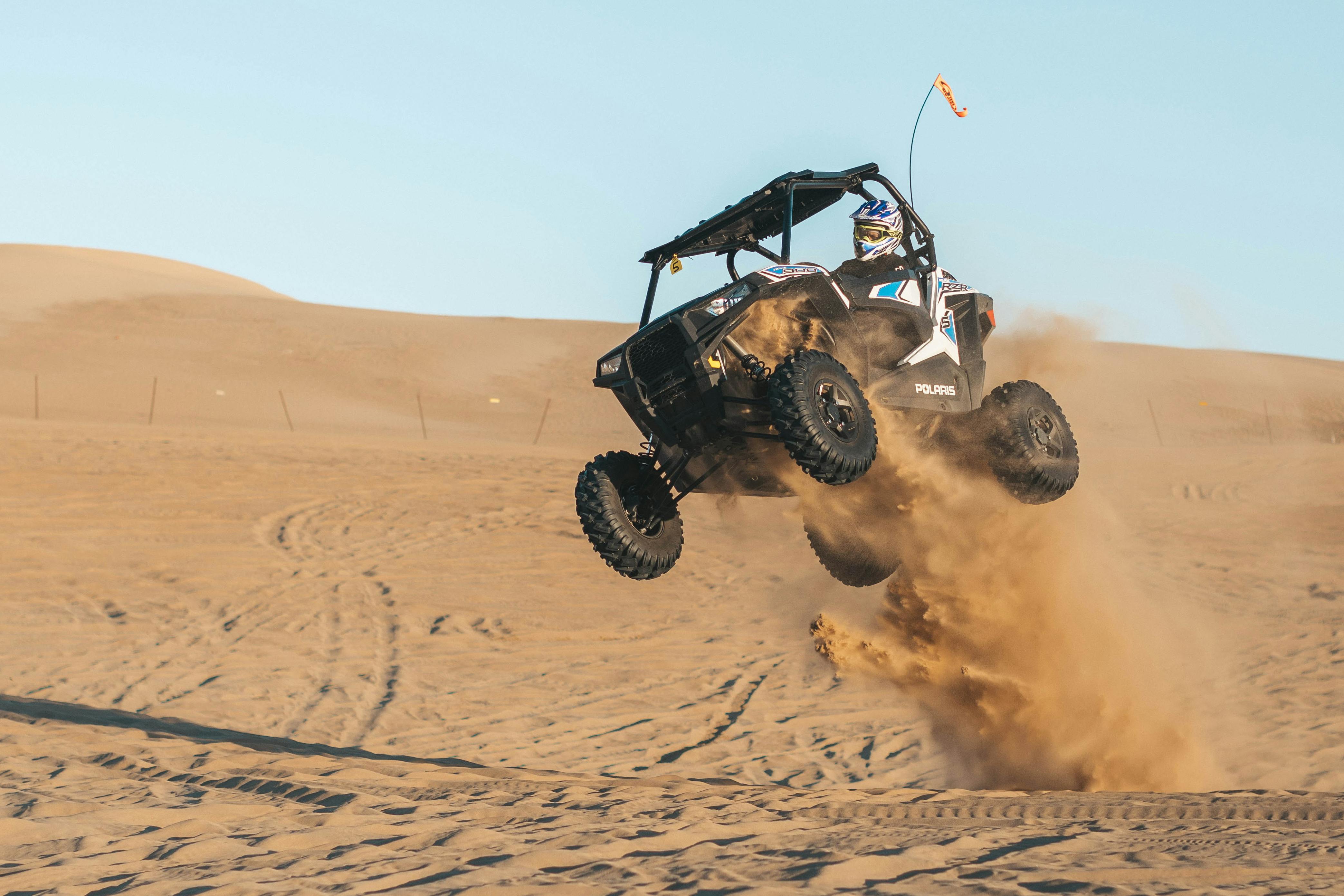 Dune buggy in mid-jump.