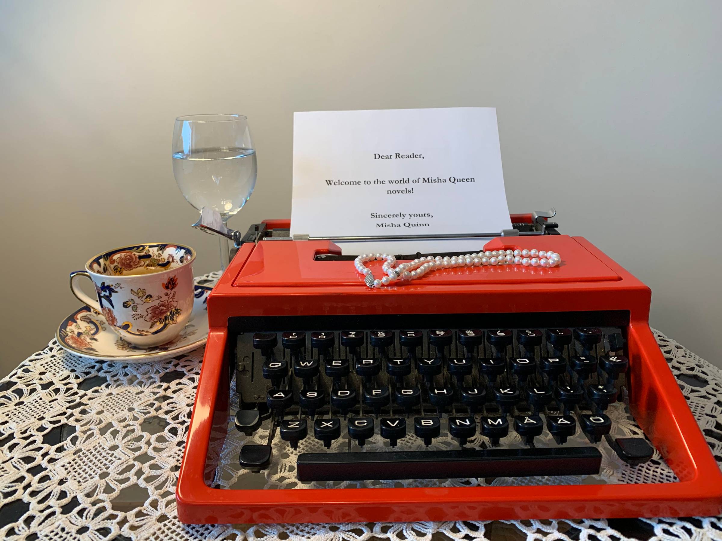red typewriter on the table