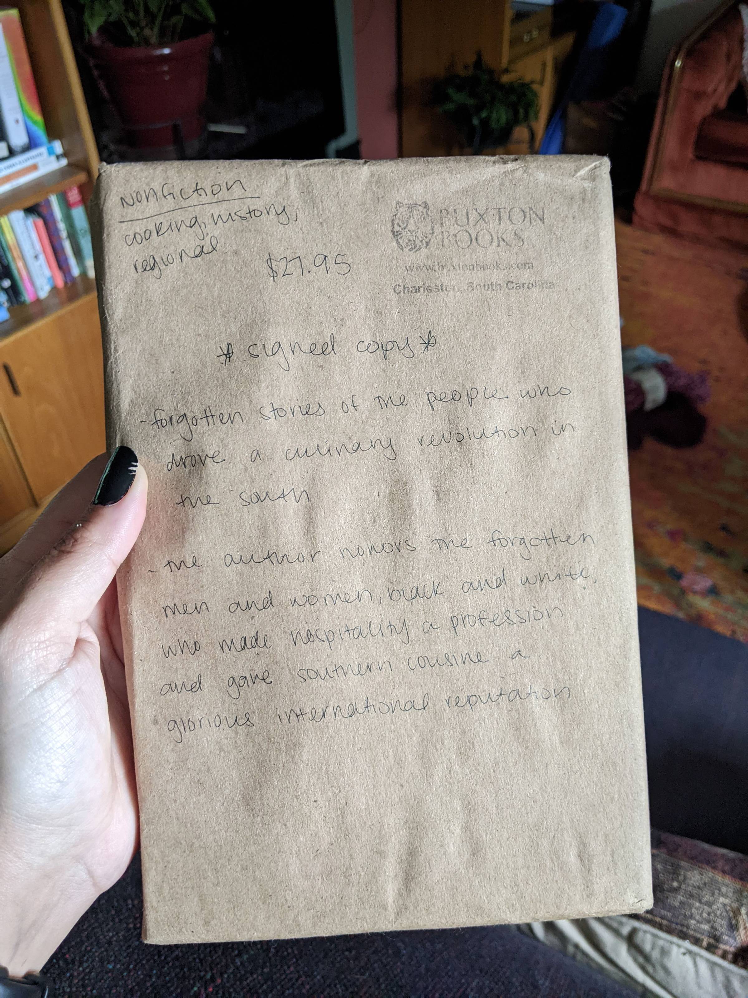 Mystery book with brown packaging, description of the book written on the front.