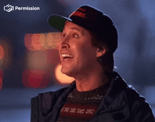 Clark Griswold looking shocked at the house lit up in lights. 
