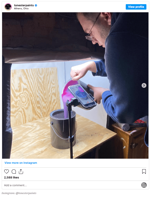 Tony Piloseno pours paint while making a TikTok video.