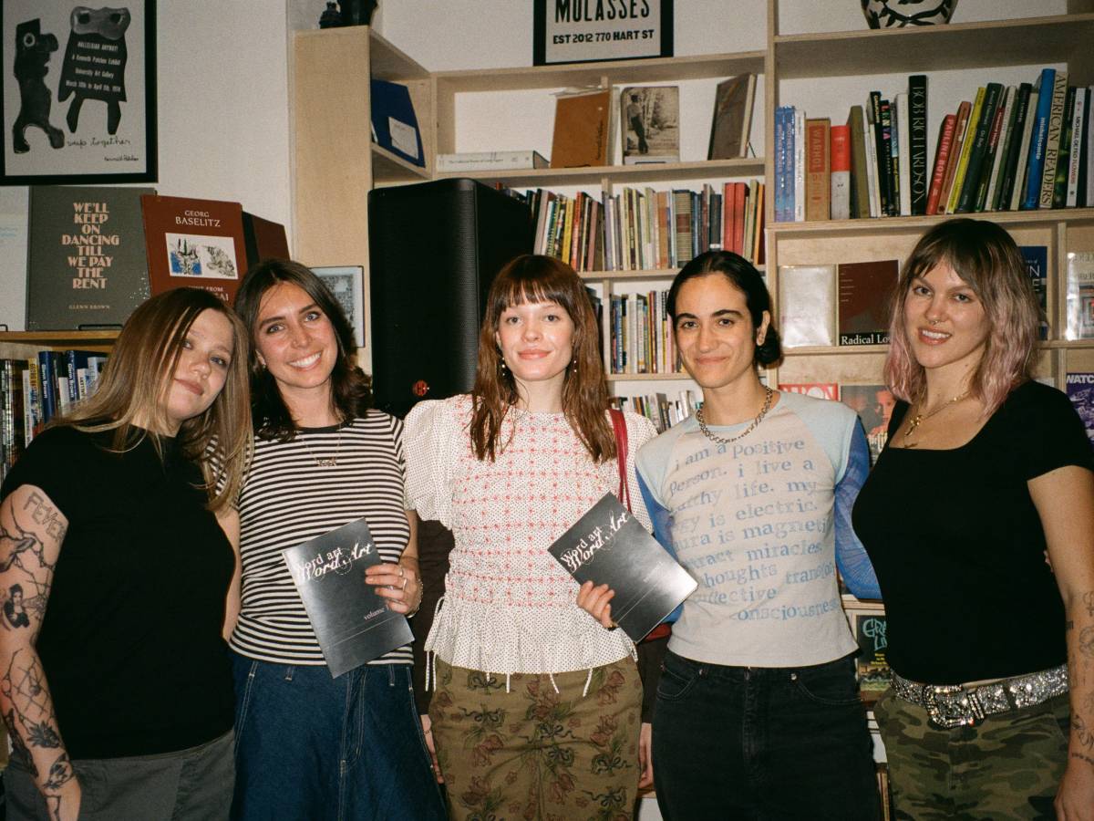 A photo of our Founding Publisher, Birdy (far left), and our Managing Director, Cassidy (far right), with the Word Art team.
