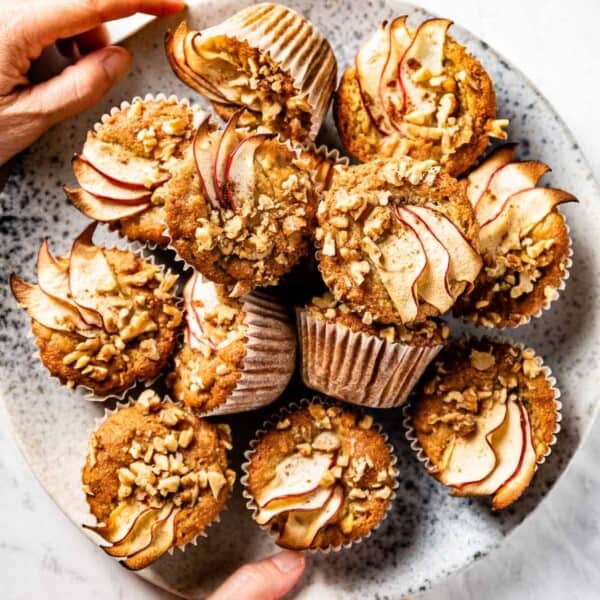 Apple almond muffins on a plate.