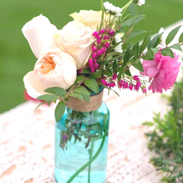 A vase filled with flowers sitting on top of a table