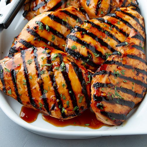 Grilled chicken breasts covered in a soy honey glaze.