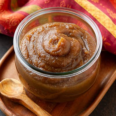 Apple butter in a glass jar.