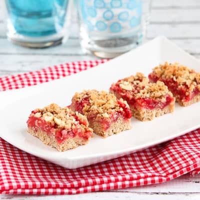 Strawberry oat bars on a white plate.