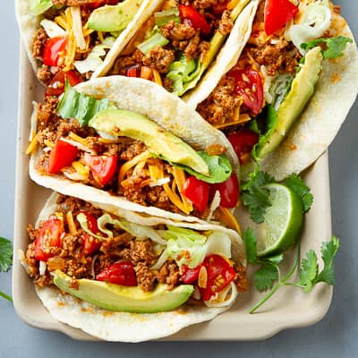 Tacos filled with ground turkey and avocado.