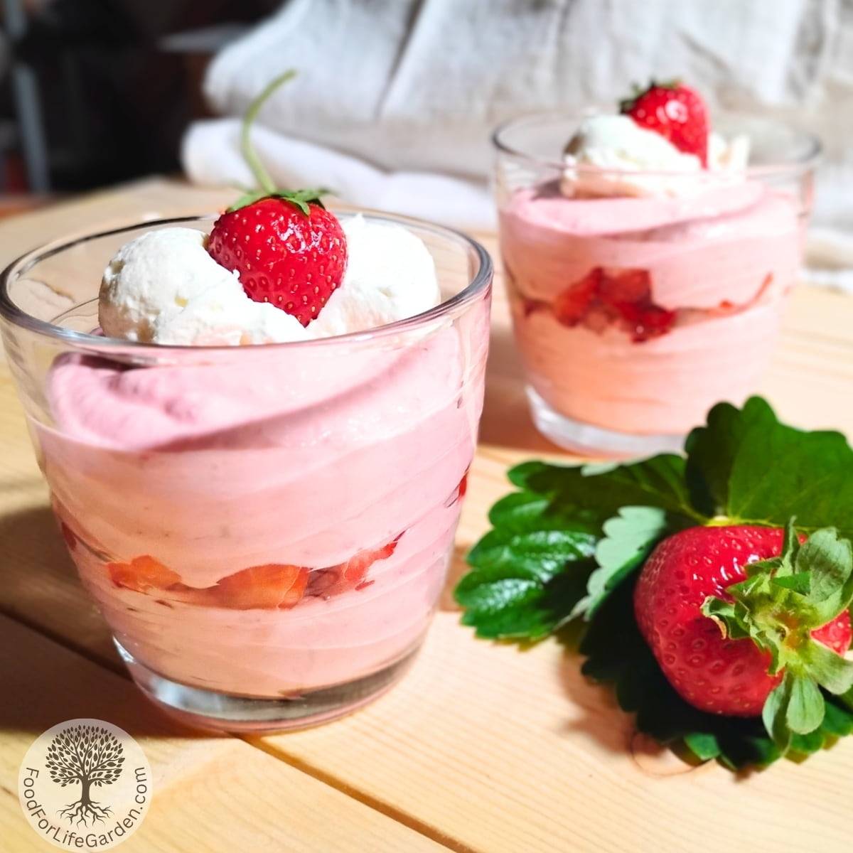strawberry quark layered in serving glasses with strawberry decorations