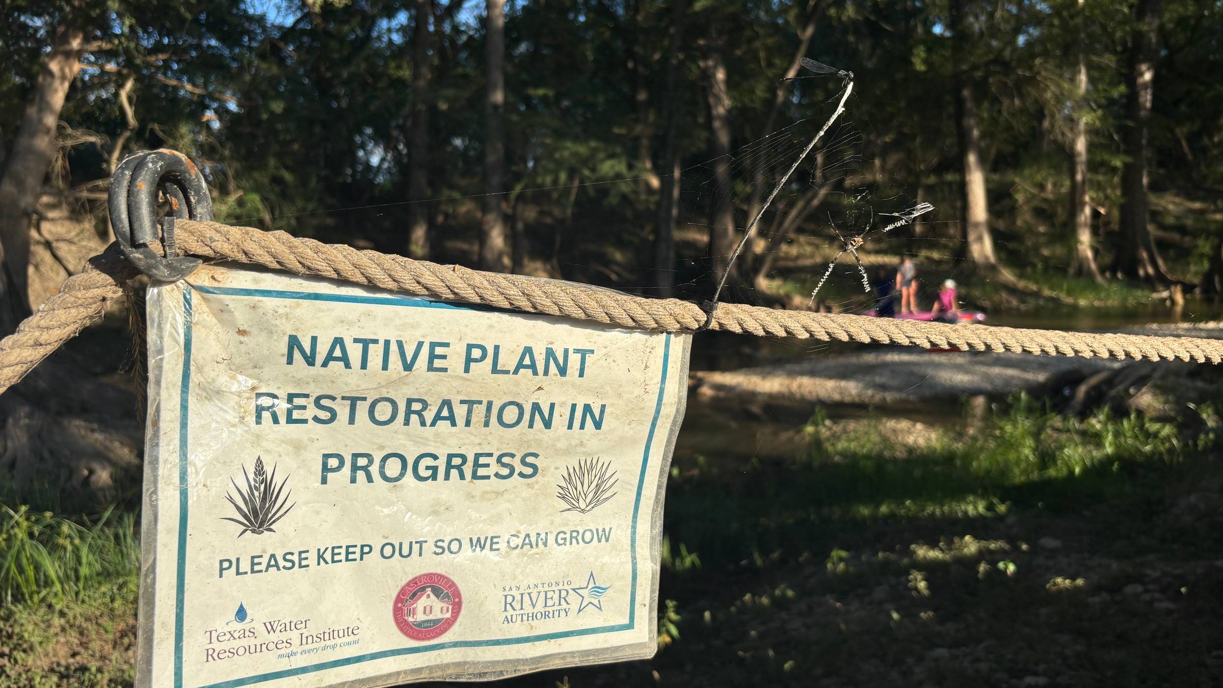 Restoration in progress sign at the Riparian Demo Garden