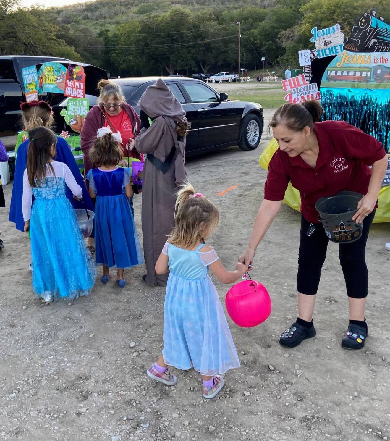handing out candy at boo bash