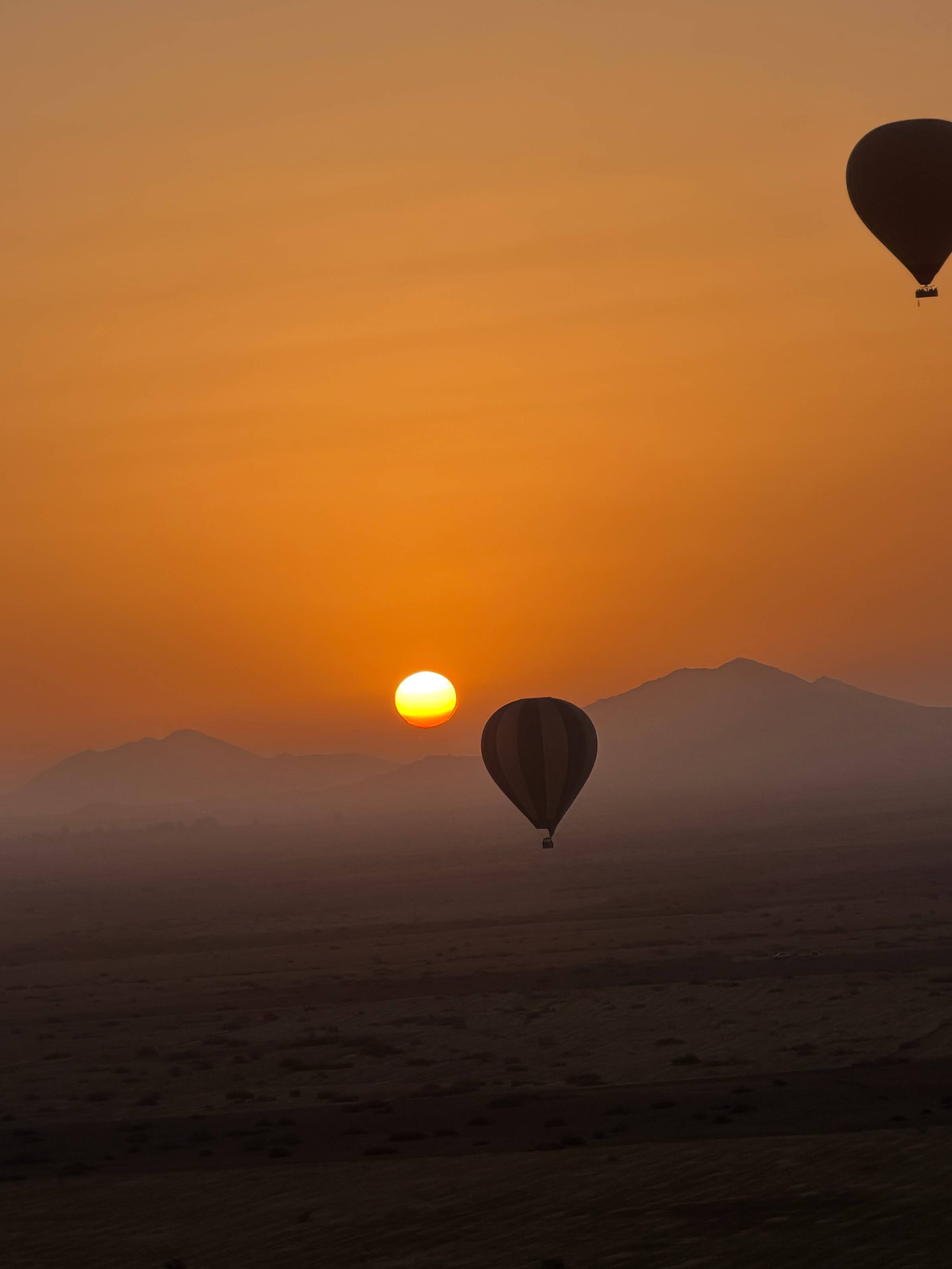 Hot air balloons at sunrise in Morocco