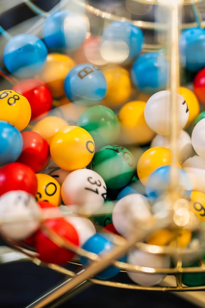 Colorful lottery balls in a spinning cage.