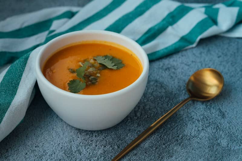 soup in white ceramic bowl