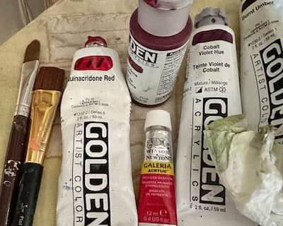 paint brushes and paint tubes